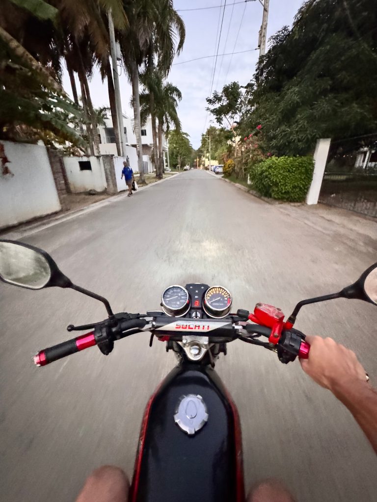 Driving a SUCATI 200cc motorcycle in the Cabarete, Dominican Republic